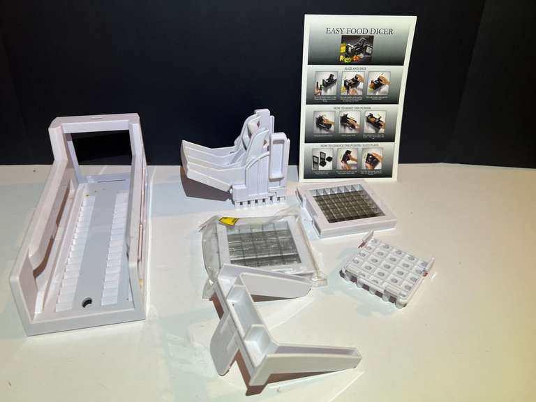 BR3… Food dicer with assorted blades, please inspect, no guarantee all parts are there, see pictures for details. image