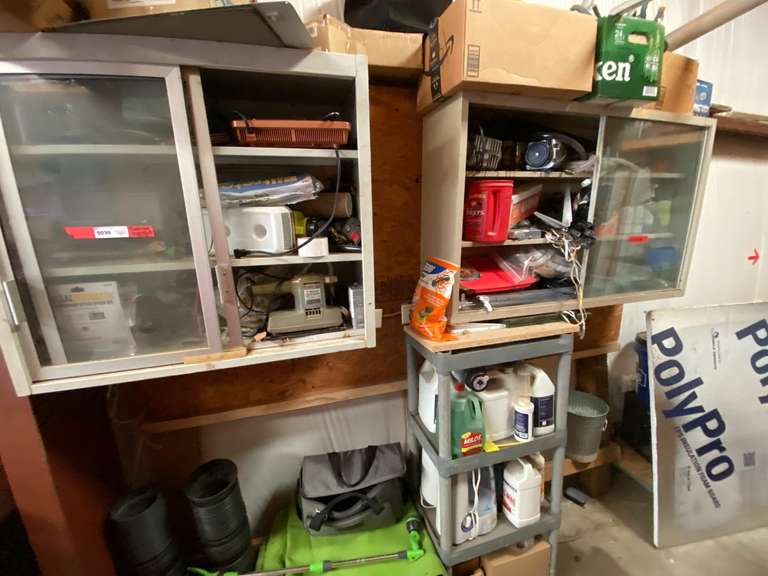 Content of two shop cabinets, and on floor directly below, content only to include a Black & Decker dual action sander, powers up, Ryobi 18 V Defender sprayer, powers up, watering wand, shop hangers, plastic pots, chain oil, and much more. See pictures for details. image