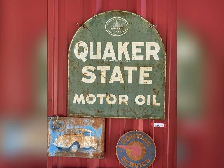 Vintage signs to include Quaker State motor oil, Volkswagen, and Pontiac service sign, see pictures for details. image