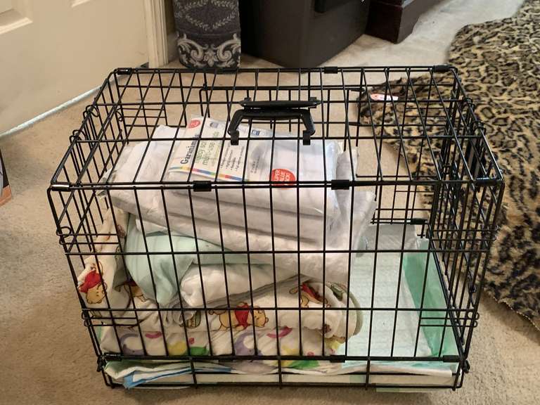 METAL PET CRATE FULL OF DOG BLANKETS & WATERPROOF PADS - 13" WIDE X 16" TALL X 22" DEEP - UP MASTER BED image