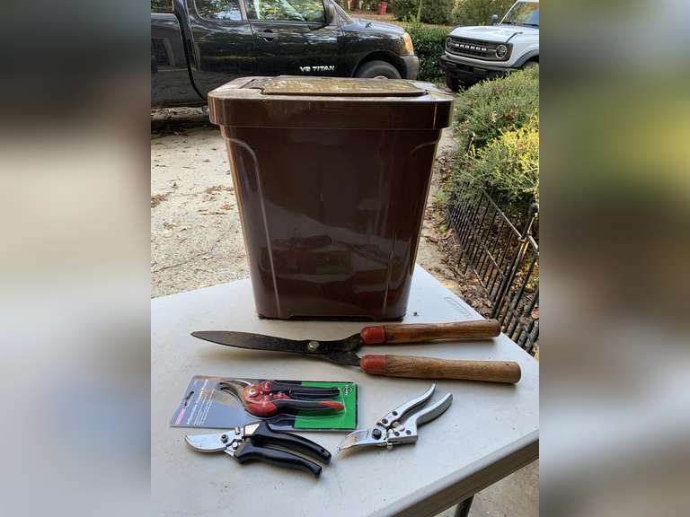 LONG HANDLE HEDGE TRIMMERS, NEW CRAFTSMAN PRUNERS, STIHL PRUNER, OTHER PRUNER & NEW FLIP TOP TRASH CAN - GARAGE image