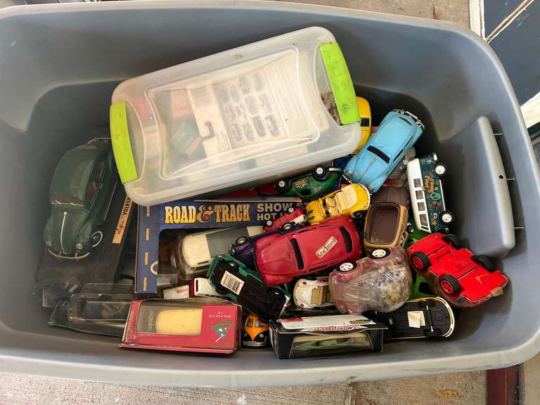 Tub of assorted diecast cars, and more, some are still new in the package, see pictures for details. image