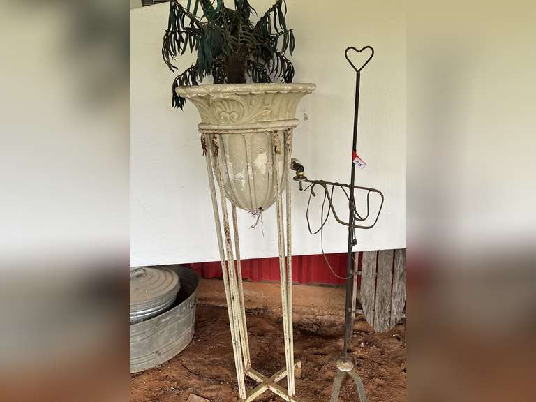 Tall metal plant stand and vintage lamp image