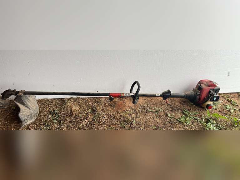 Troy Bilt weedeater, not locked up, working condition unknown image