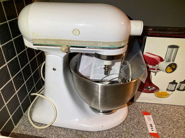 KIT… KitchenAid stand mixer, with accessories, powers up, see pictures for details. image