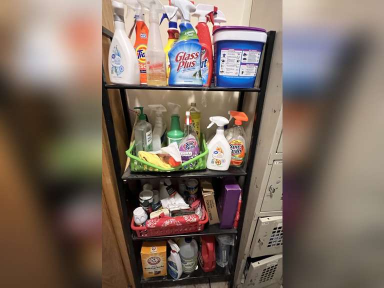 Laundry… Metal four shelf shelving unit, includes all content of assorted cleaning items, see pictures for details. image