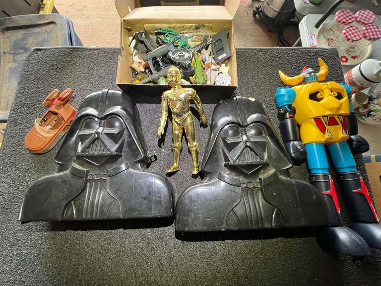 Star Wars memorabilia to include Darth Vader storage cases, set of two with assorted action figures, and more. See pictures for details. image