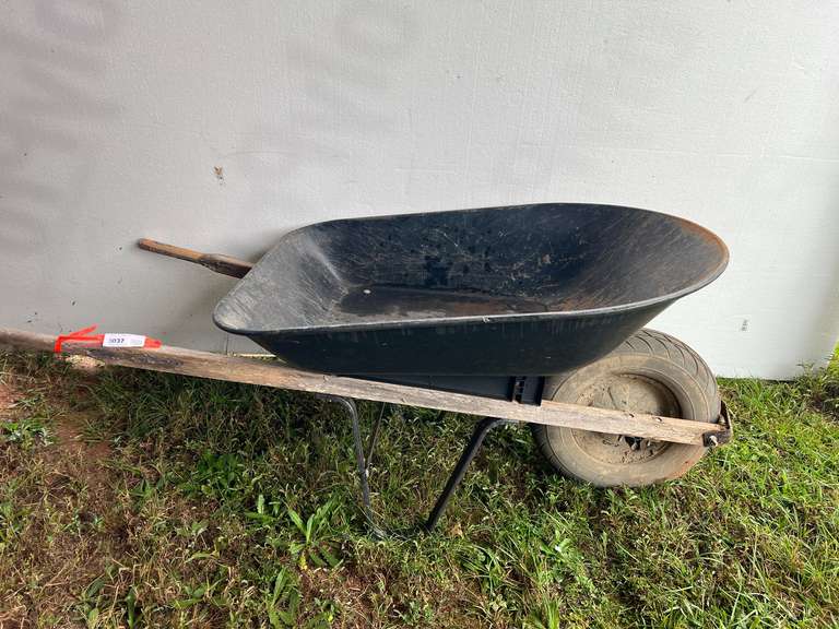 Metal with wood handle wheel barrel image