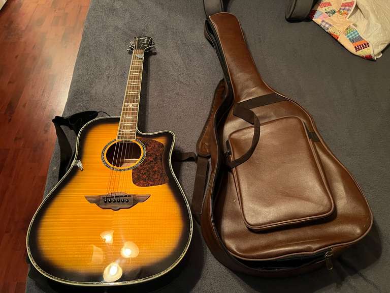 BR2…Urban acoustic guitar with carrying case, see pictures for details. image