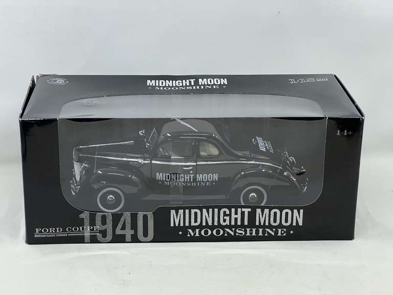 KIT… Midnight Moon Moonshine car, 1/18 scale, this piece is autographed by Jr Johnson, seller states this is an authentic autograph, still new in the box, see pictures for details. image
