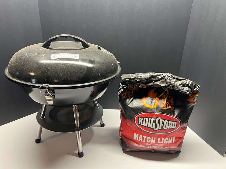DEN… Cuisinart small tabletop grill, comes with partial bag of charcoal, see pictures for details. image