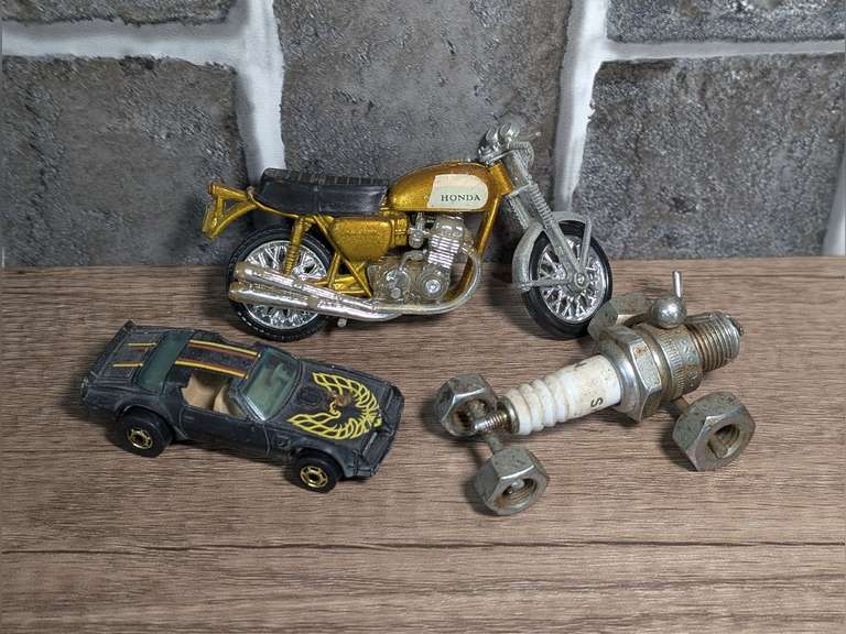 STEAMPUNK FOLK ART SPARK PLUG CAR FIGURE, VINTAGE HONDA MOTORCYCLE MODEL, AND VINTAGE FIREBIRD HOT WHEELS image
