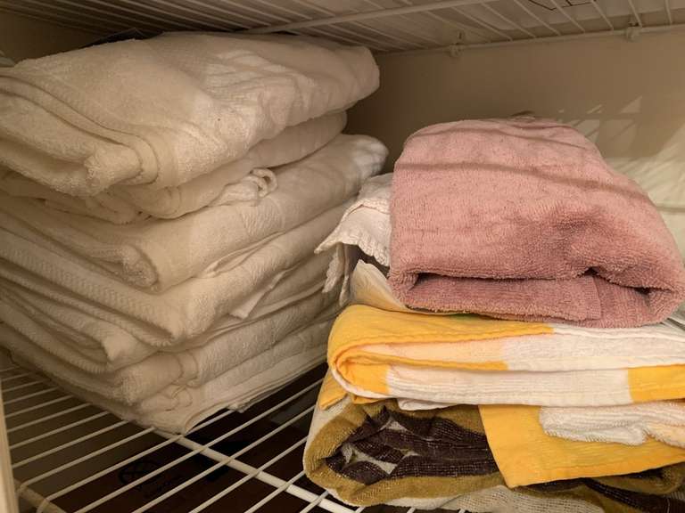 ASSORTMENT OF NEW TOWELS - UP HALL BATH CLOSET image