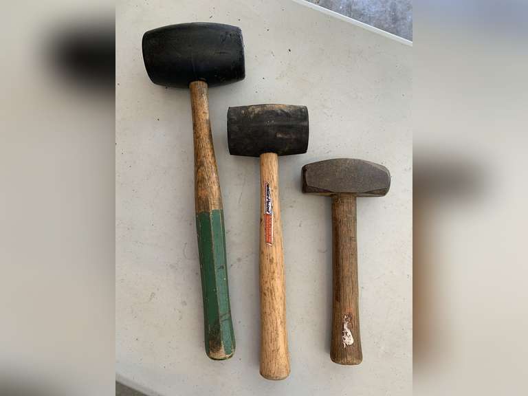 2 RUBBER MALLETS & 1 SHORT METAL MALLET - GARAGE image