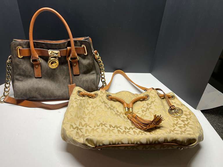Laundry… Ladies handbags, both are marked Michael Kors, see pictures for details. image