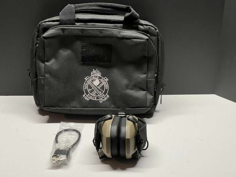 DEN… Soft sided Springfield armory bag, contains earmuffs, and a gun lock, see pictures for details. image