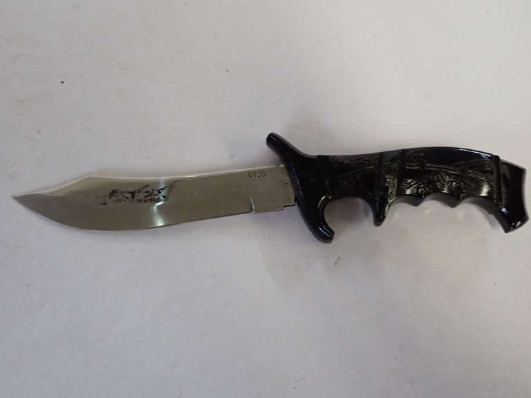 Collectible Hunting Knife with Decorative Handle and Blade Design image
