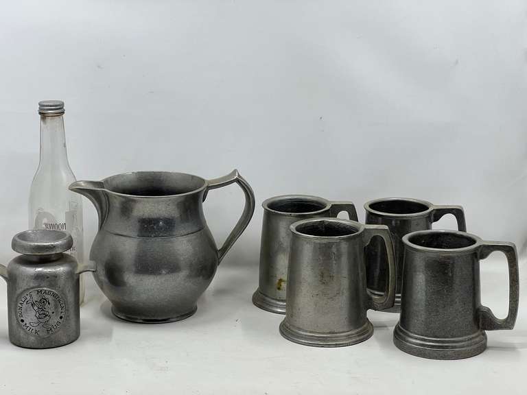 KIT…Drink set with pitcher and four tankards, believed to be pewter, pitcher is Wilton, also includes Donald’s Magnificent Milk Mug from the Walt Disney Company, see pictures for details. image