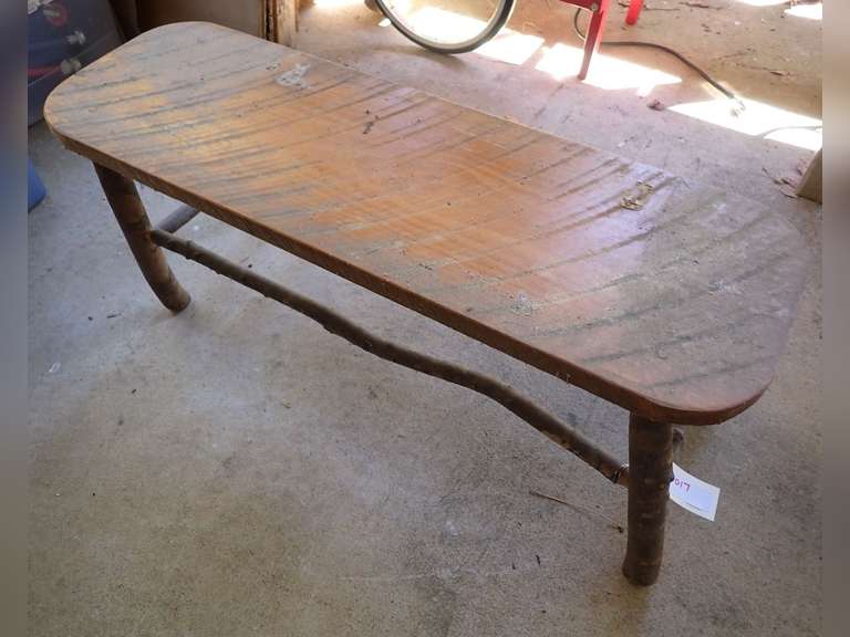 Rustic Wooden Bench with Branch Legs image