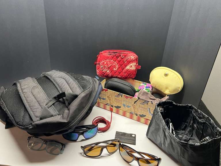 DEN… Large assortment of sunglasses and more, also includes a Targus backpack, see pictures for details. image