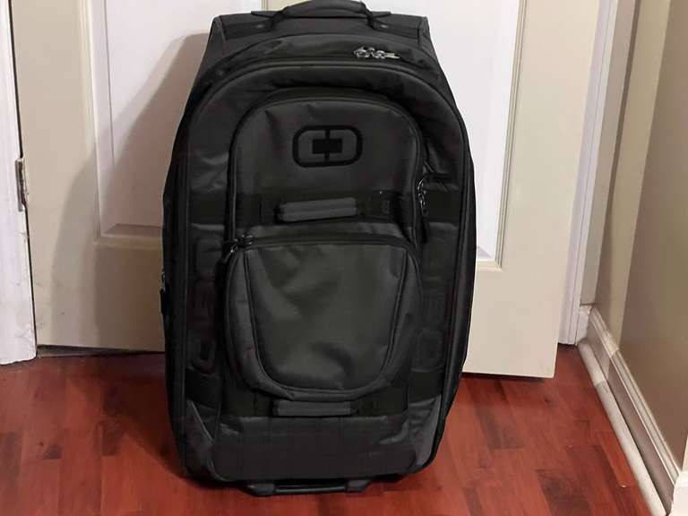 BR4… Soft sided suitcase with telescoping handle, see pictures for details. image