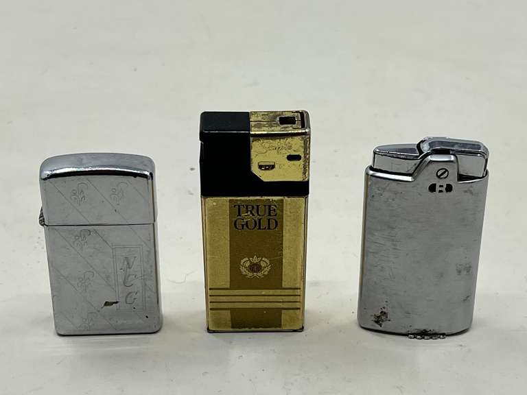 DEN… Vintage cigarette lighters, three pieces, includes a Zippo, tub is not included, see pictures for details image
