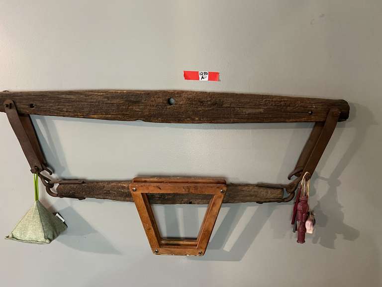 DEN… Custom wall hanging fashioned from an antique yoke/hames with assorted household items/decor, also includes a vintage wooden tennis racket press, see pictures for details. image