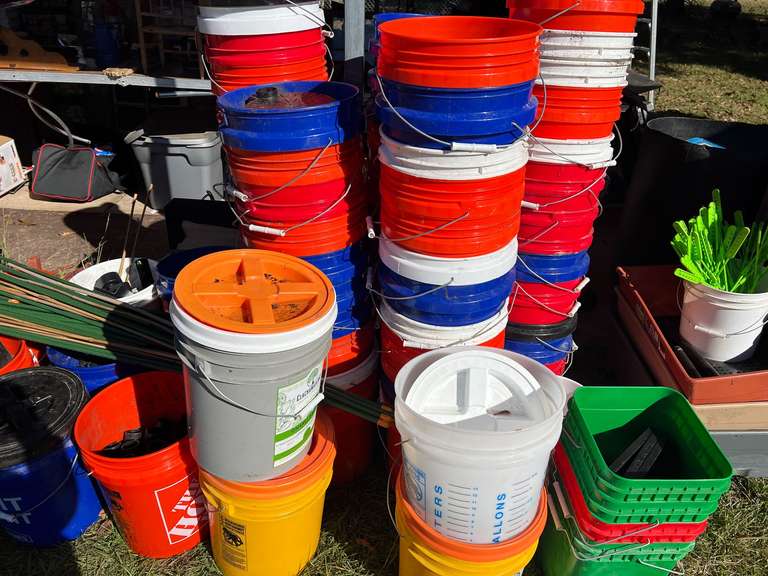 Large assortment of 5 gallon buckets, also includes sipper accessories for self watering, and assorted plant stakes, see pictures for details. image
