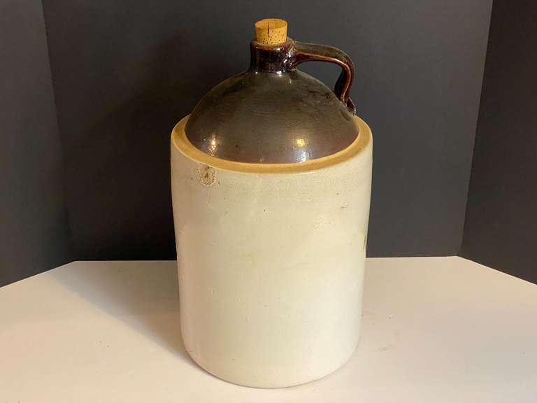 LR… Antique two toned stoneware whiskey jug, 3 gallon, see pictures for details. image