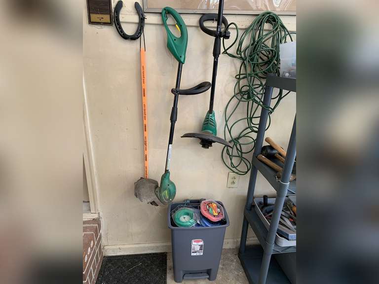 2 WEEDEATERS, TRASHCAN FULL OF NEW WEEDEATER LINE, HEADS, HORSESHOE, GRAVEL, SQUARE YARDSTICK & HEAVY DUTY EXTENSION CORD - GARAGE image