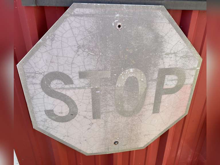 Metal stop sign, this piece is pretty washed out, see pictures for details. image