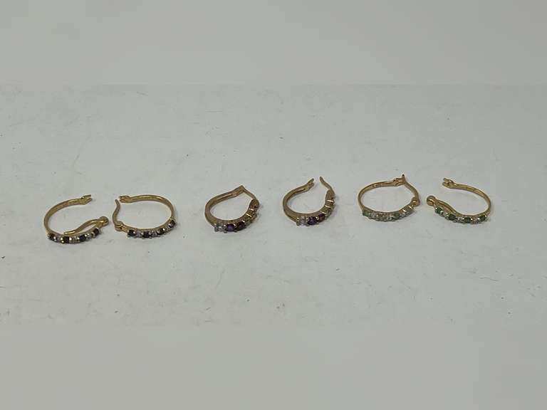 Ladies hoop earrings, three pair, with multicolored stones. These earrings are gold plated over 925, see pictures for details. image