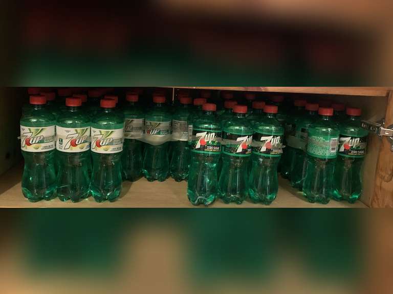 SHELF LOT OF BOTTLED 7UP ZERO SUGAR DRINKS (UNSURE OF EXPIRATION) - KITCHEN image