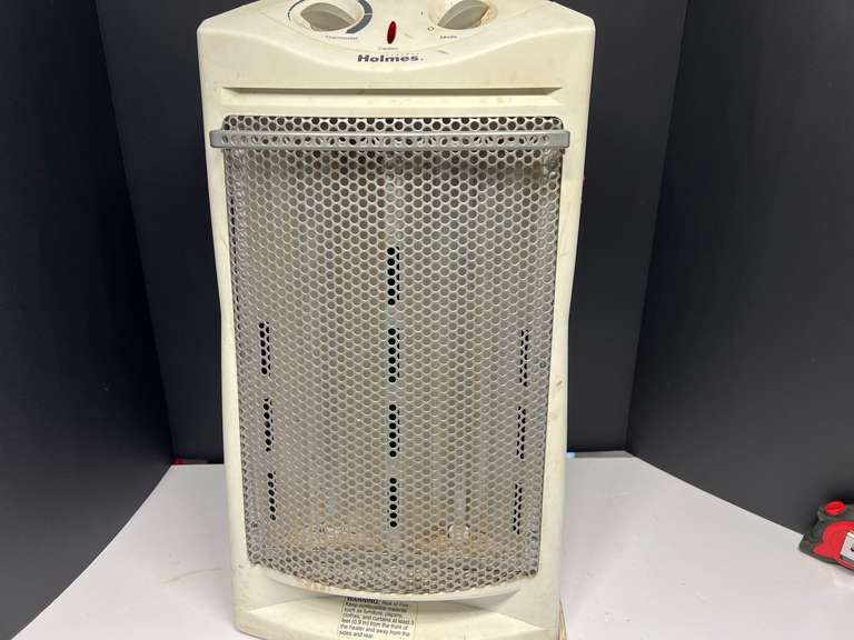 Holmes standing space heater, powers up, see pictures for details. image