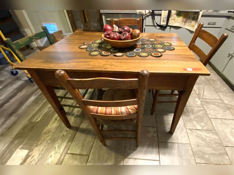 KIT… Vintage farmhouse table, comes with four ladder back chairs with slatted seats and table decor, see pictures for details. image