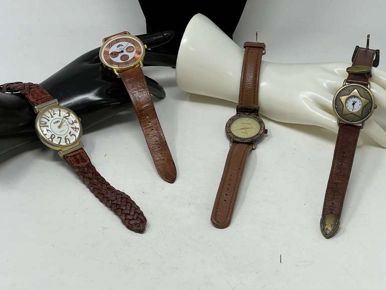 Ladies fashion estate jewelry watches to include Gitano, Guess, and more, four pieces total, see pictures for details. image