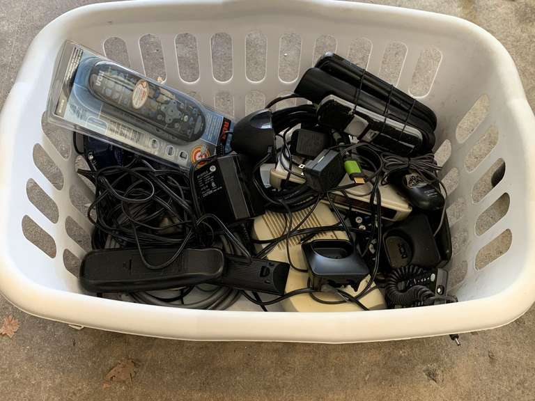 LAUNDRY BASKET FULL OF MISC PHONES CLOCK RADIOS, REMOTES & MORE - GARAGE image