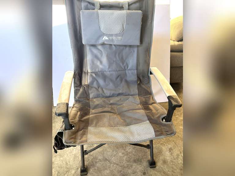 Folding camp chair, see pictures for details. image