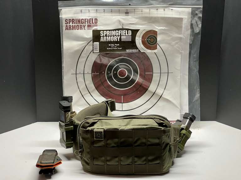 DEN… Military style gun belt filled with approximately 11-9 mm magazines. Nine of these are loaded with 9 mm Luger ammunition.. Also includes targets and more, see pictures for details. image