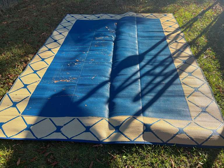 Large outdoor woven area rug, see pictures for details. image