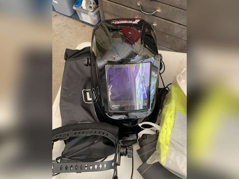 LINCOLN ELECTRIC WELDER PROTECTION HELMET, APRON, HARD HAT, SAFETY VEST & GRABBER - GARAGE CLOSET image