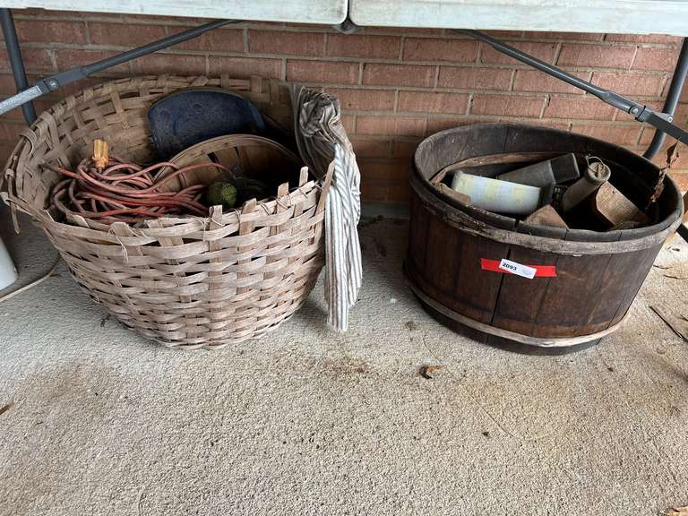 Vintage wooden half barrel, with content, also includes a vintage woven basket with content, see pictures for details. image