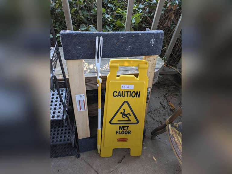 CAUTION WET FLOOR SIGN, FURNITURE DOLLY, AND DUSTER HANDLE image