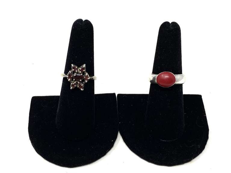 Ladies sterling silver rings, one is stamped 925, includes one with a red stone, believed to be red coral, and one stamped sterling with a cluster of red stones, believed to be garnet, see pictures for details. image