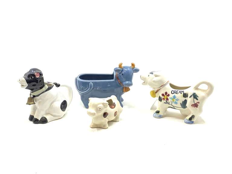 LR…Cow creamers and decor, four pieces total, see pictures for details. image