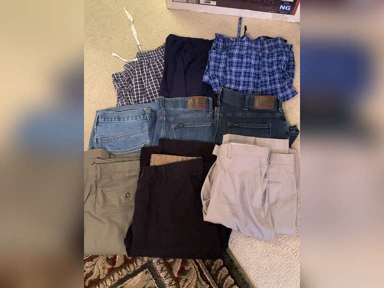 MEN'S CLOTHING LOT TO INCLUDE - PJ PANTS, 3 PAIR JEANS, 3 PAIR PANTS (1 NEW W/ TAG) CONTENTS IN ALL 3 DRAWERS OF END TABLE - UP BED 1 image