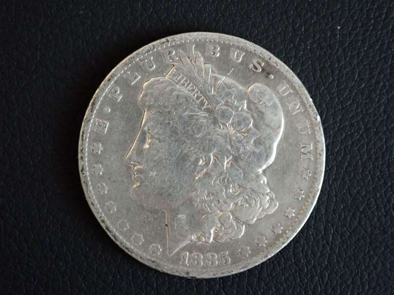 1885-O MORGAN SILVER DOLLAR COIN