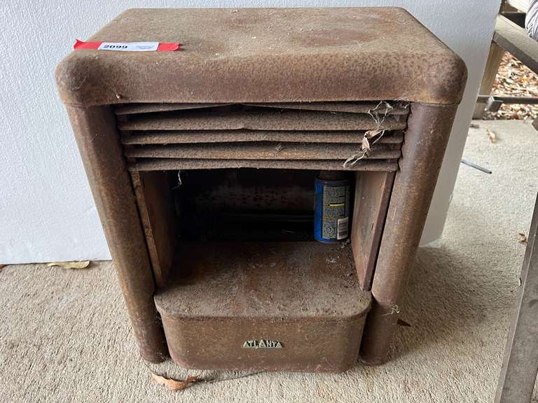 Vintage Atlanta brand gas heater, rust is present, see pictures for details. image