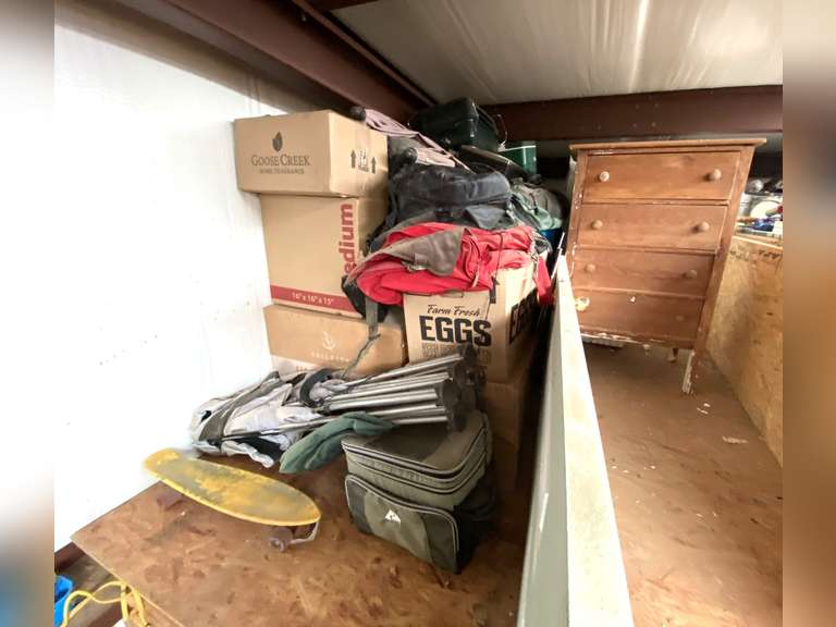Mystery loft content, includes items on lower loft markrd 5042 to include a vintage wooden 4 drawer chest , interior panel door, tabletop grill, igloo lunch cooler, and much more. See pictures for details. image