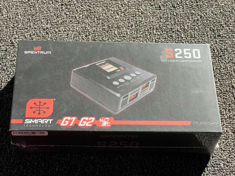 Spektrum S250 2 X 50W AC smart charger, still new in the box, see pictures for details. image